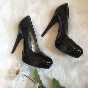 Guess black platform heels